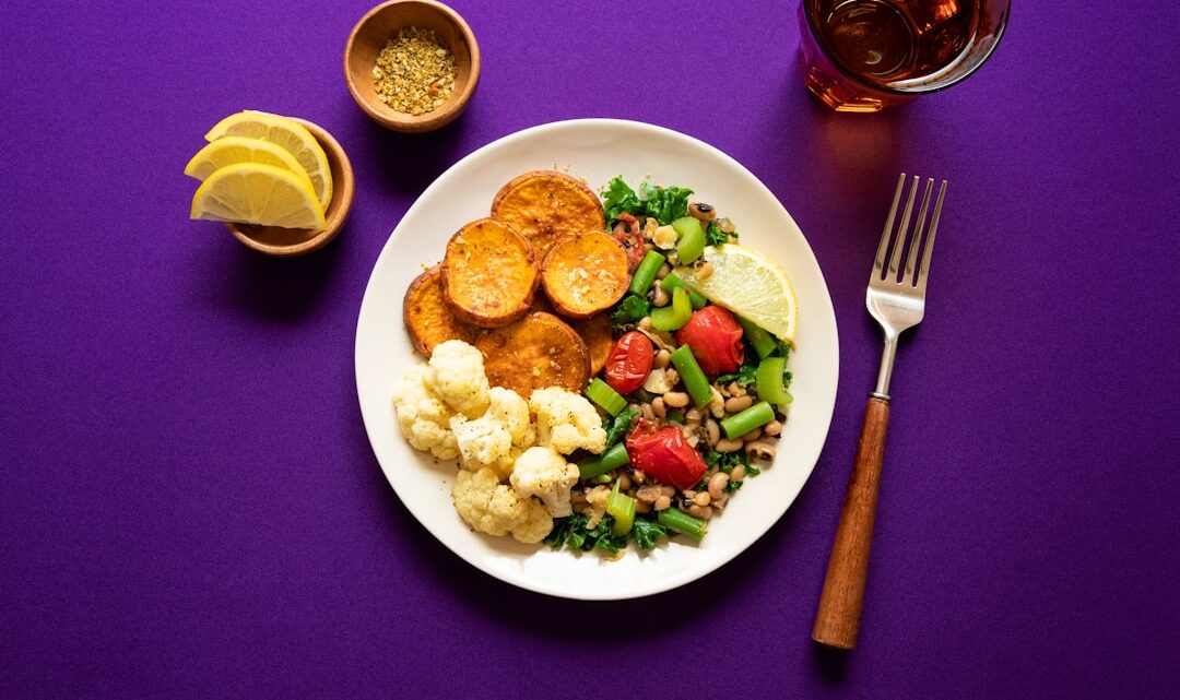 Muscle Growth Meal Plan cover showing a balanced plate, dumbbells, a grocery list, and a progress chart