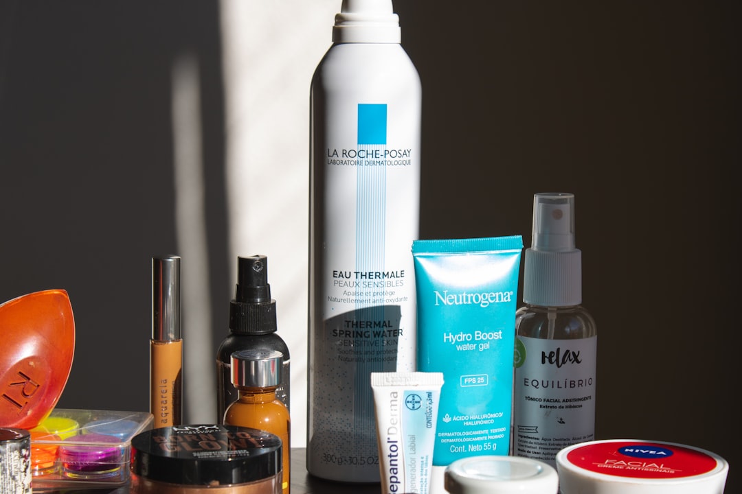 Illustration of a step-by-step skin barrier repair routine with gentle skincare products, towels, and water droplets on a clean bathroom shelf