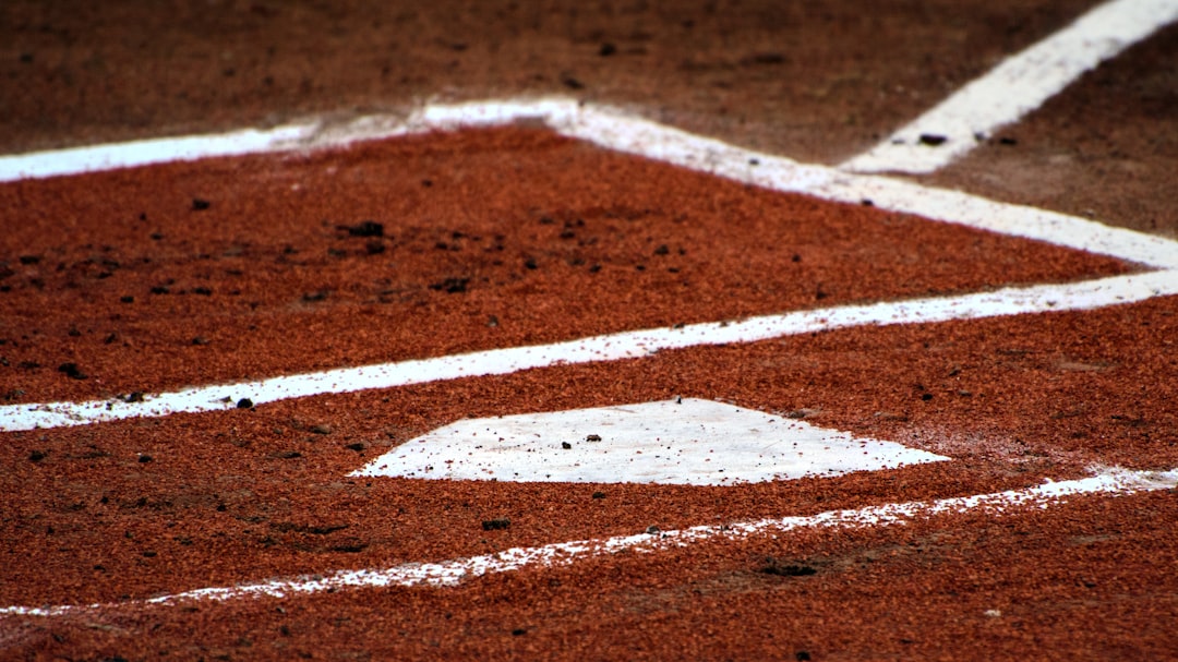 Cover image for youth baseball practice plan with diamond diagram, stopwatch, cones, and tee, emphasizing a 90-minute template and drills