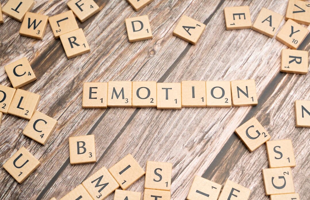 Emotional regulation for anxious emotions cover image showing a calm silhouette with layered breathing waves and a warm editorial layout
